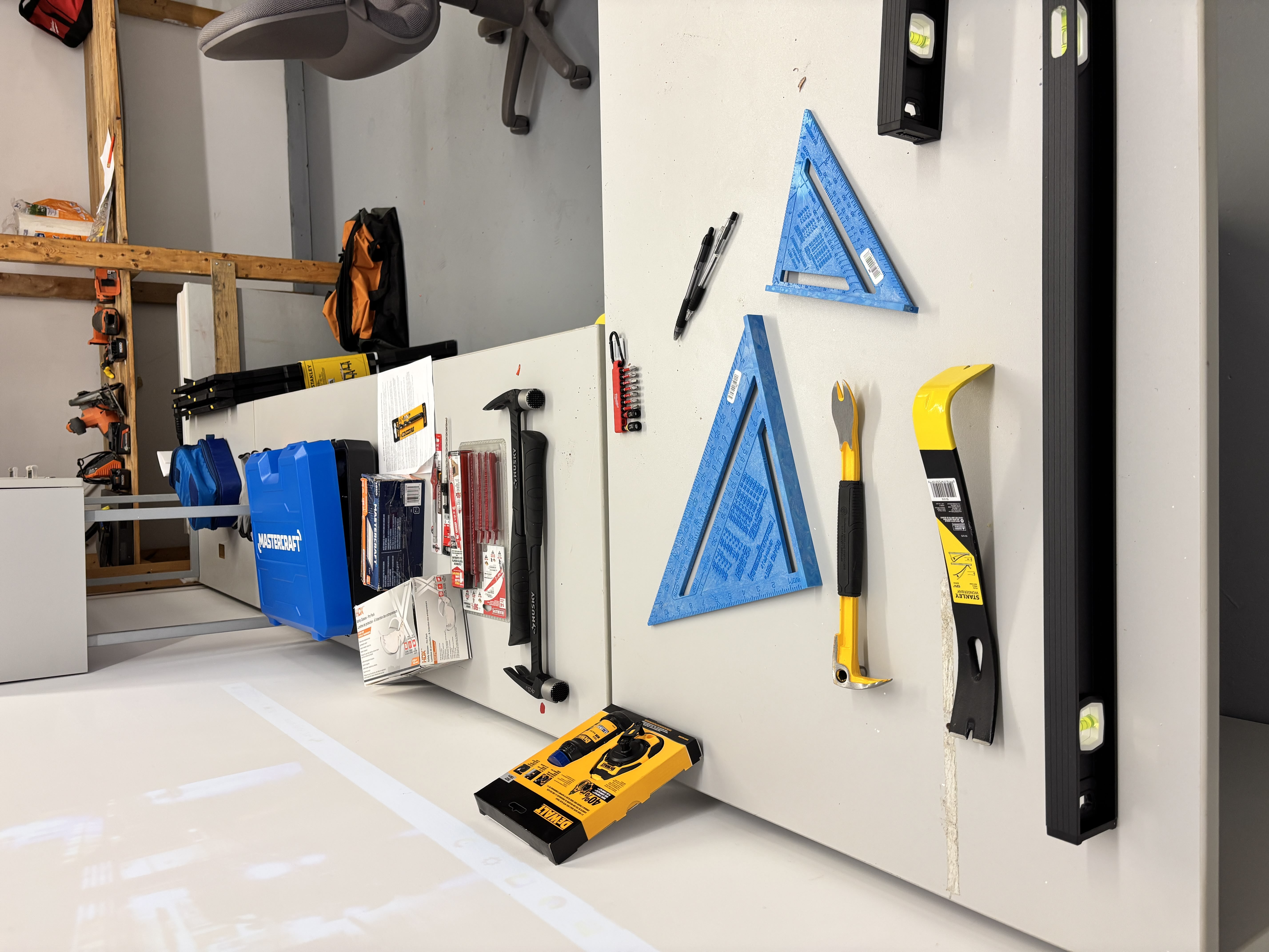 Hand tools laid out on training desk