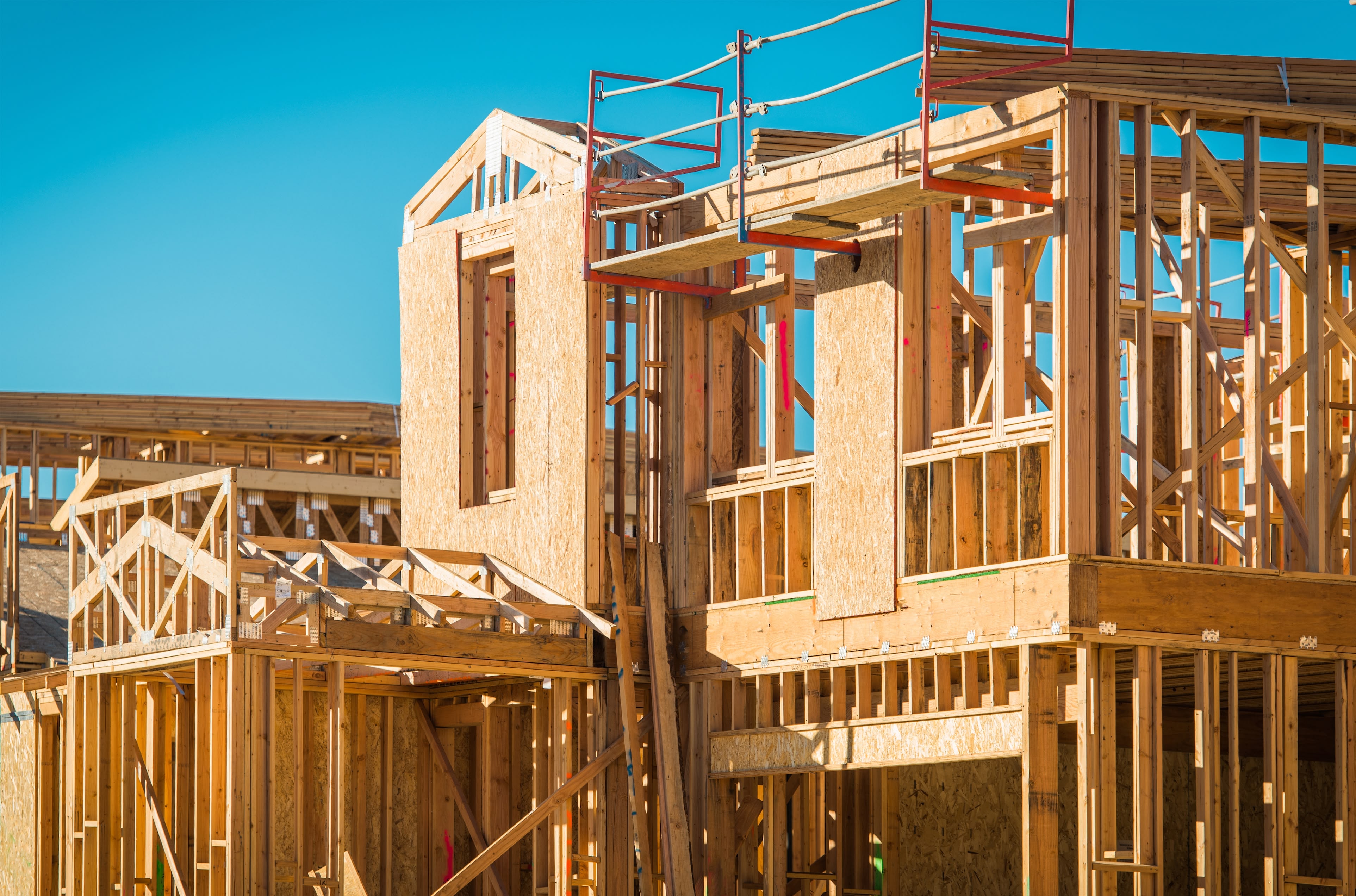 New home construction site with wood framing