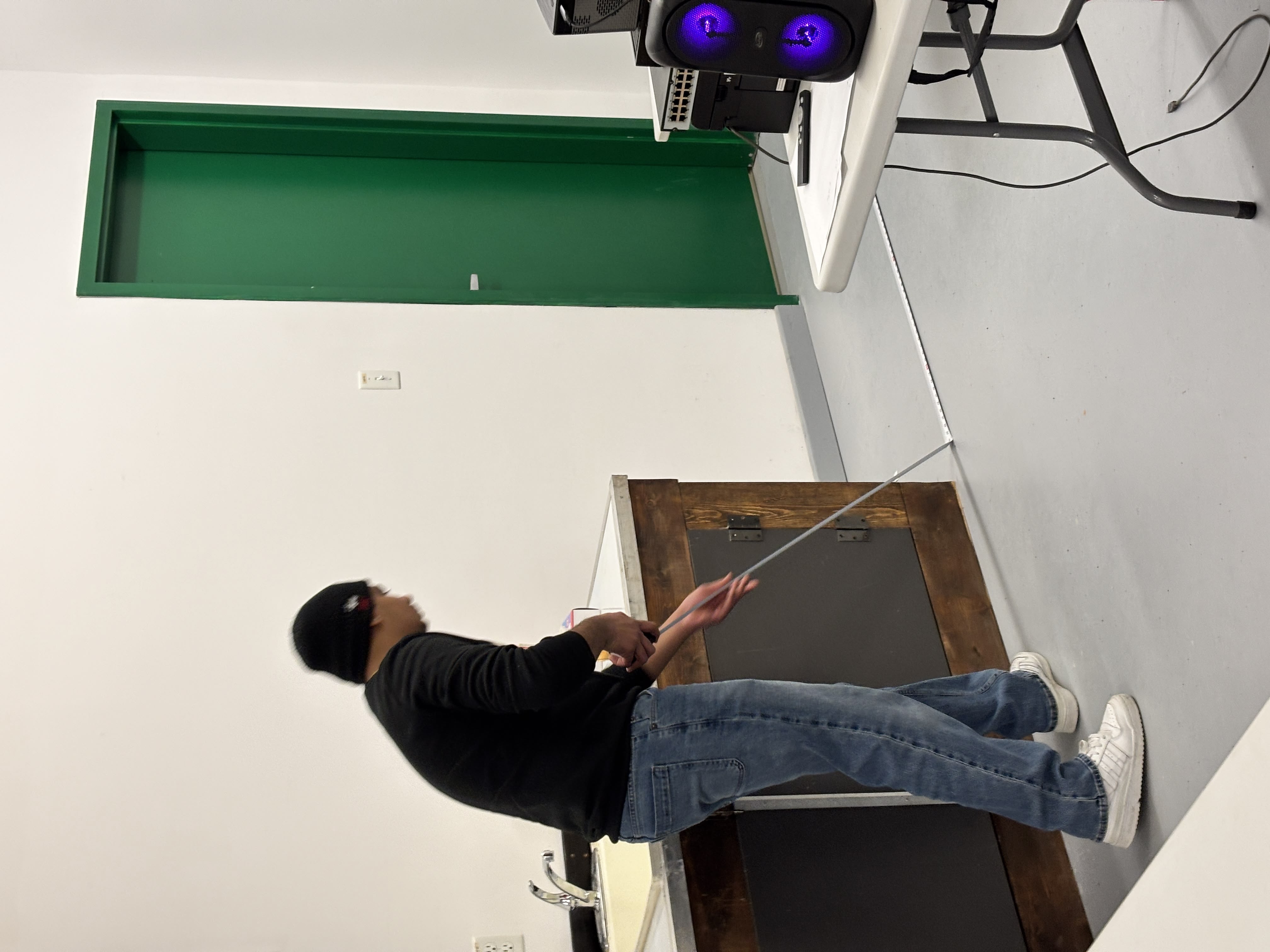 Student practising measuring in training room